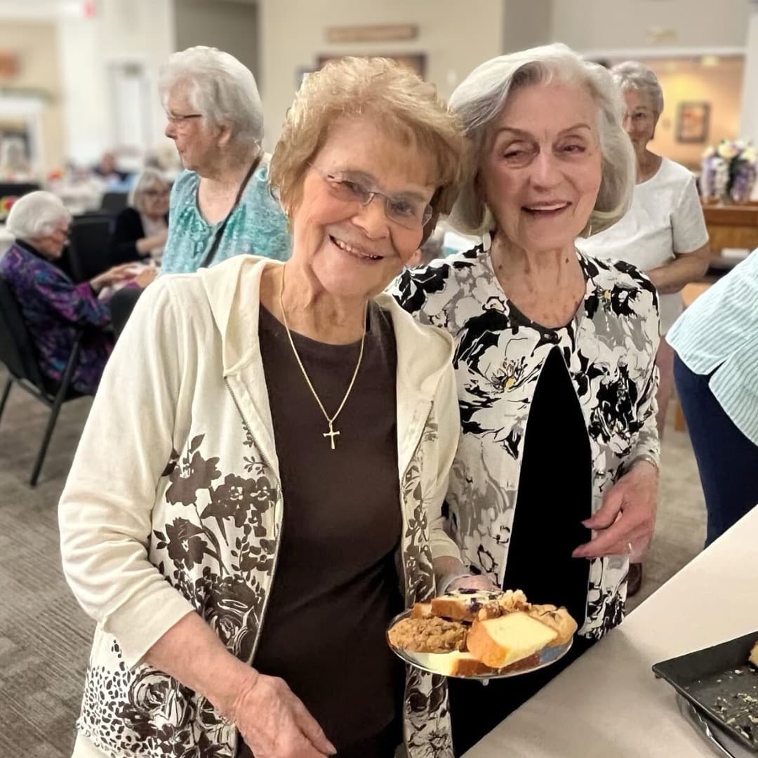 Happy residents enjoying food together